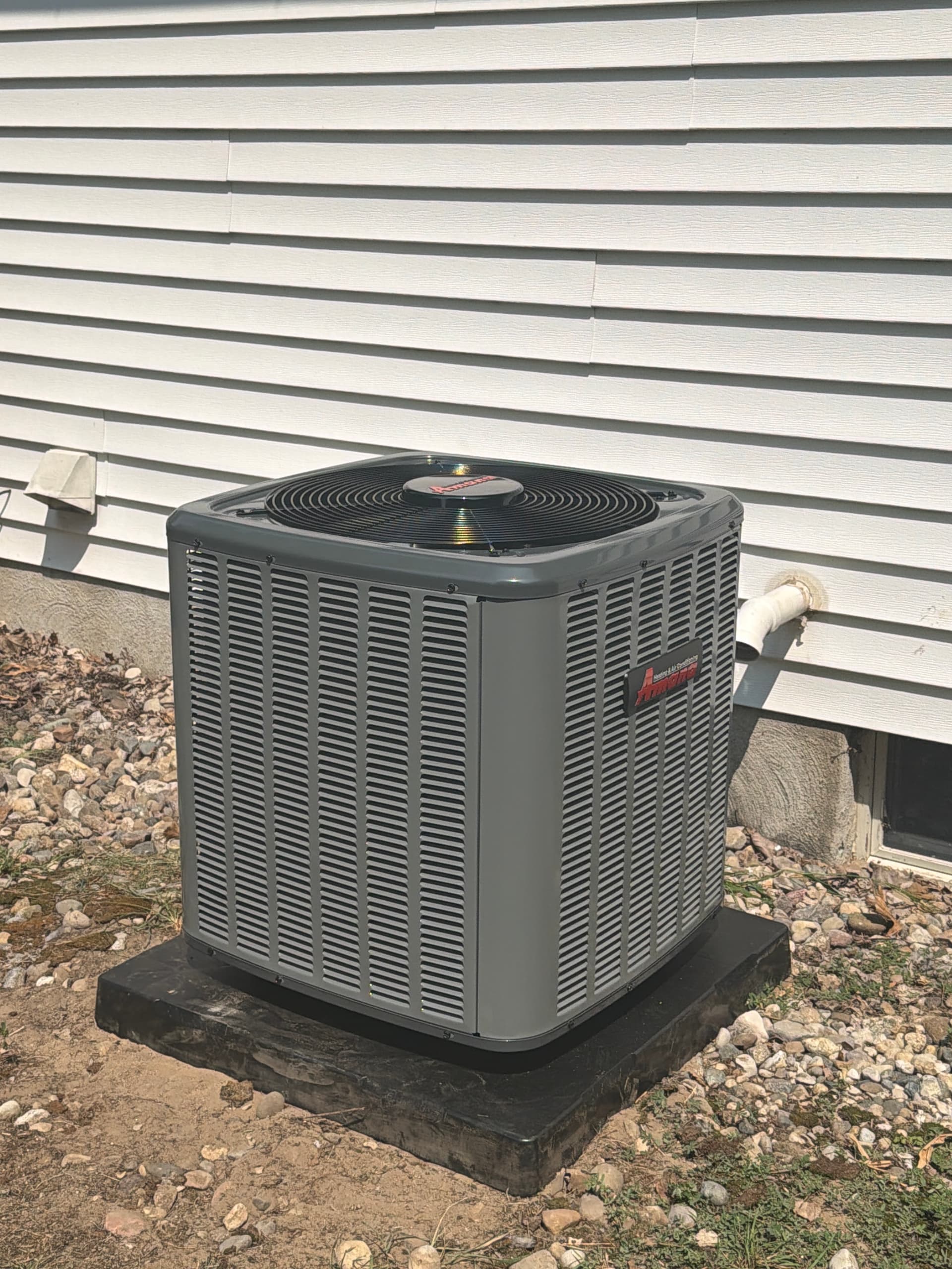 Old R-22 AC System Replaced with a Brand New Amana Unit image