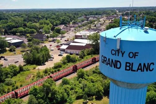 Aerial view of Grand Blanc, Michigan with the City of Grand Blanc water tower